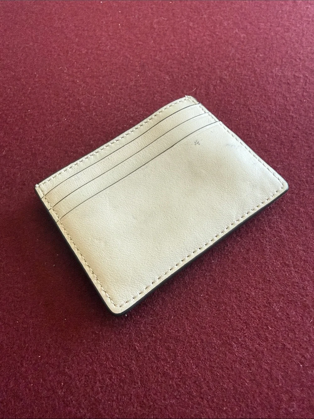 kate spade cream quilted leather card case with gold logo